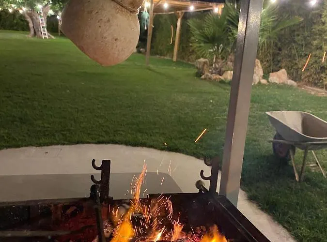 All'ombra Del Carrubo